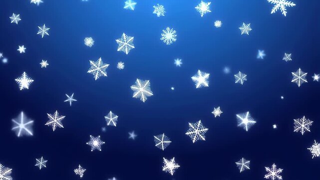 Falling snowflakes on a deep blue winter background
