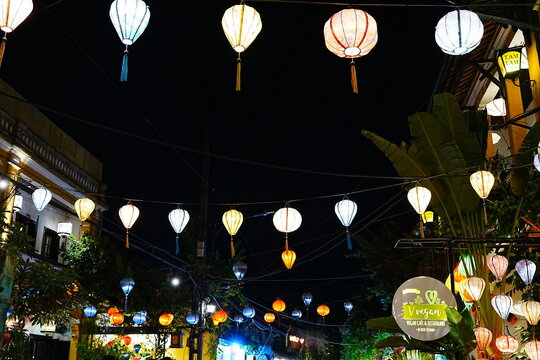 Glowing traditional colorful lanterns at night in Hoi An ancient town, Vietnam
