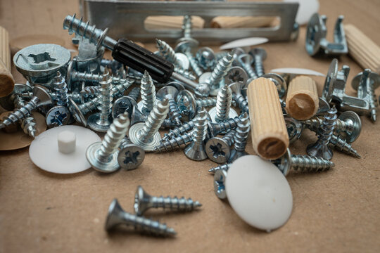 Furniture Assembly Concept with Screw and Fastener Set for Cabinet Construction