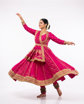 young indian kathak dancer performing an elegant chakkar spinning pose representing indian classical dance cultural heritage performing arts and traditional artistic expression