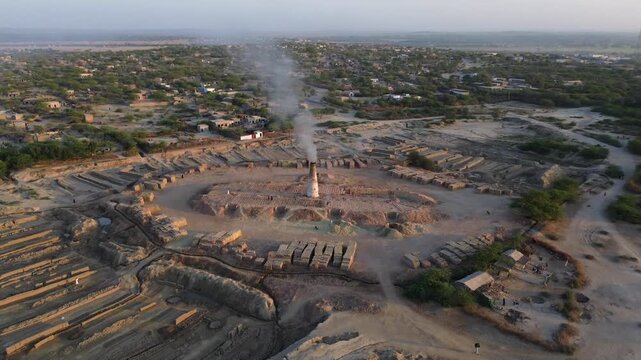 Drone view of brick kiln industry producing construction bricks in Sindh, Pakistan