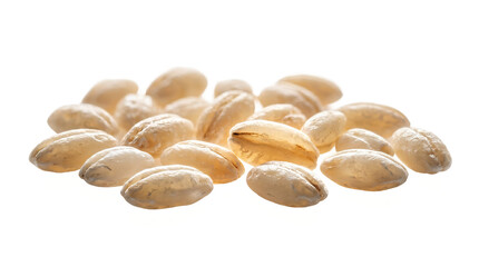 Obraz premium Barley grains are gathered in a small pile on a white surface to highlight the natural shape of the cereal.