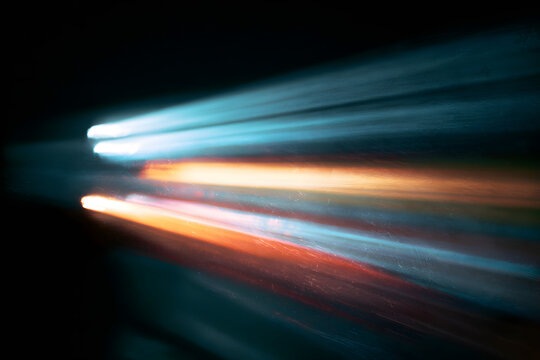 film motion blur, colorful light leaks, retro grain, noisy film, distressed texture, light leak, flare on black background, old film, burn ray