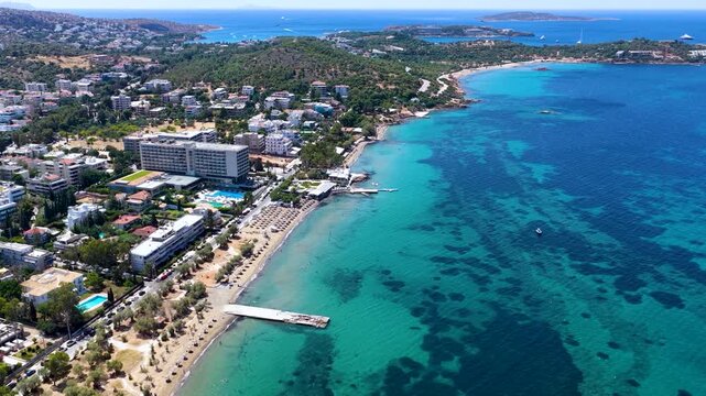 Establishing aerial view of the small and big Kavouri beach located in Voula, south Athens Riviera, Greece