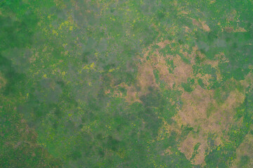 Degraded pasture land with patchy soil erosion dried grass texture agriculture problems drone shot © UrbanWitness