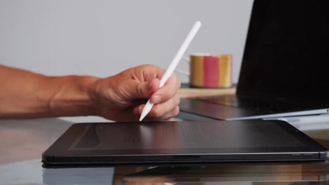 Signing Electronic Document on Tablet with Stylus Close Up