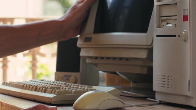 IT Engineer Using Retro Computer for Work and Gaming at Home