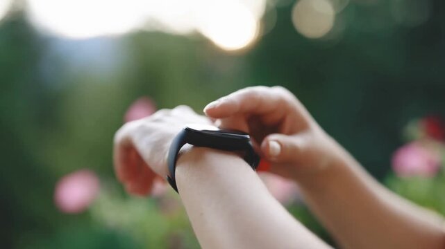 Checking Heart Rate on Smartwatch Fitness Tracker