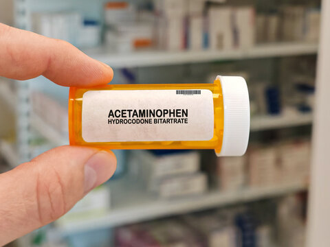 Box of ACETAMINOPHEN HYDROCODONE BITARTRATE analgesic combination medicine for pain fever and symptom relief
