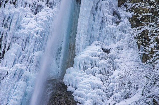 Urach waterfall full of bizarre ice formations frozen at winter temperatures, Bad Urach, Swabian Jura, Baden-W&uuml;rttemberg, Germany