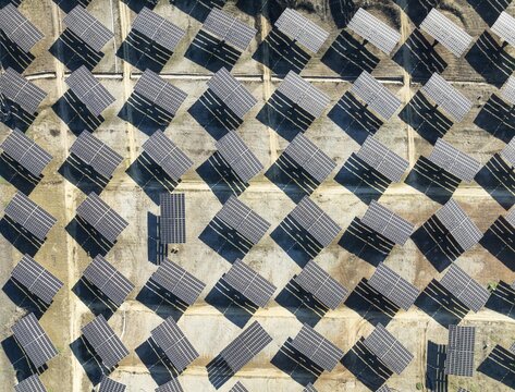 Rows of solar panels at a photovoltaic plant near Vejer de la Frontera. Aerial view. Drone shot. C&aacute;diz province, Andalusia, Spain