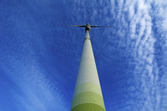 Wind turbine with small fleecy clouds (cirrocumulus) in the sky, Karsberg, Upper Franconia, Bavaria, Germany