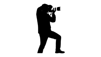 Silhouette of a Photographer: A lone photographer stands captured in silhouette, focused intently on framing a shot with a professional camera. © Asma