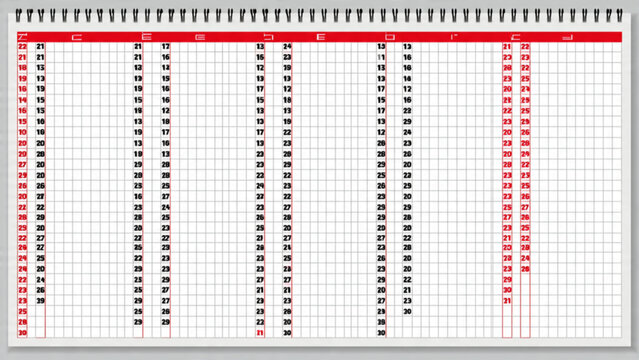 Close up of digital spreadsheet displaying rows and columns of data in a professional workspace