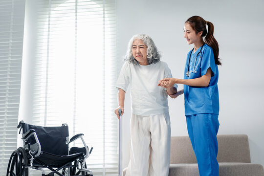 Young healthcare professional offers compassionate walking assis