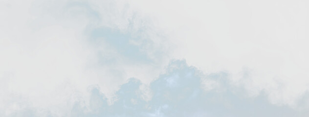 Clouds drift across a clear blue sky during the daytime in an open outdoor area with no visible objects or structures, on a transparent background © Liubov