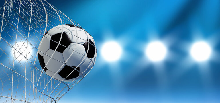 Black and white soccer ball in goal net with blue background  and flood light rays - 3D illustration