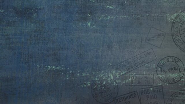 A faded blue abstract grunge retro-style background with traces of roughness on a gray wall with postmarks and inscriptions, looped animated texture.