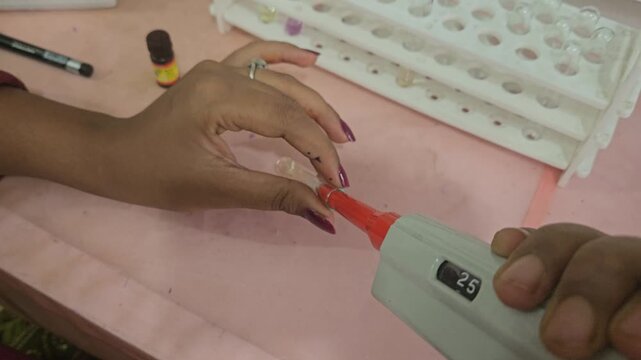 Laboratory Technician Performing Clinical Chemistry Sample Preparation with Micropipette and Reagents in Modern Medical Laboratory, Diagnostic Testing, Biotechnology, Healthcare Research, 4K Footage