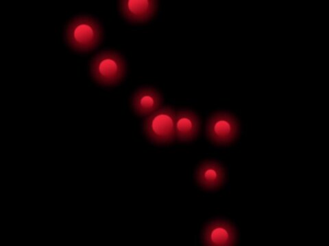 red dot particles with a glowing effect like fireflies