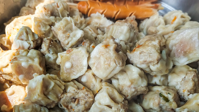 Close-up of freshly steamed siomay dumplings, a popular Indonesian street food and traditional Asian dim sum appetizer, featuring a soft savory texture and delicate wrappers