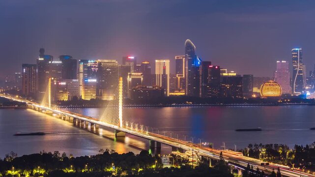 High angle timelapse of the Qianjiang Third Bridge and Qianjiang New District in Hangzhou, Zhejiang Province, China