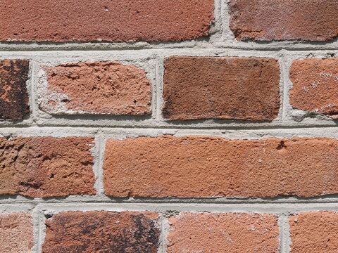 Traditional Dutch brick wall of an old farmhouse with historic masonry joints