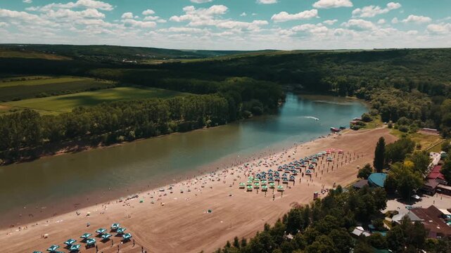 High Angle Aerial View of a Crowded Sandy Beach Resort on the Dniester River in Vadul lui Voda, Moldova