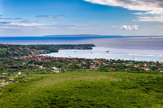 Looking over dense green mangroves toward Jungut Batu bay in Nusa Lembongan, Bali