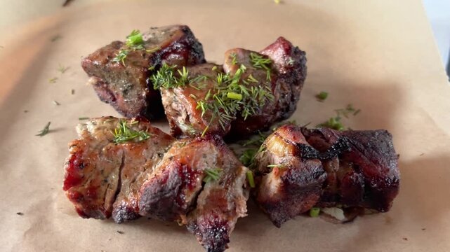 Delicious pork shashlik. Grilled meat, pieces with onions and dill. Caucasian barbecue.