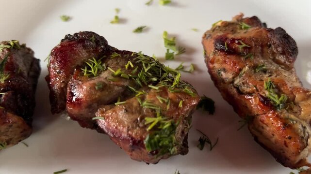 Delicious pork shashlik. Grilled meat, pieces with onions and dill. Caucasian barbecue.