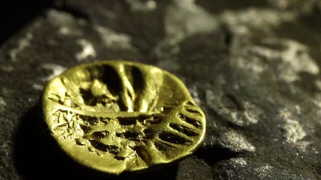 Archeological finds. Gold and silver coins from Roman and Celtic economies. Two cultures. 24th of a stater