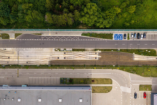 Aerial view of the advanced tram depot featuring complex track switches and adjacent infrastructure in Warsaw, Masovian Voivodeship, Poland.
