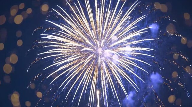 Spectacular Fireworks Display and Bokeh Sparkles at Night Sky