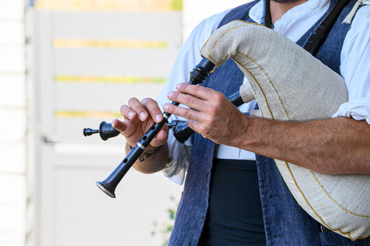 Galician musician playing traditional bagpipes The Concept of cultural heritage