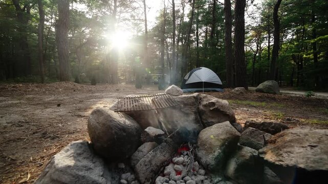 Calm cracking coals at designated outdoors camping background spot ready for a grill