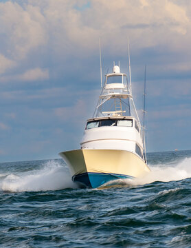 white sport fisher yacht in the sea