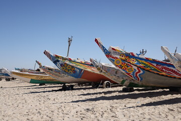 Obraz premium The colorful fishing boats on the beach of Nouakchott
