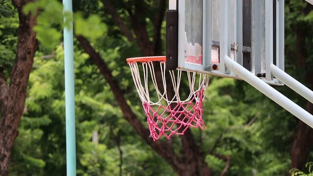 Basketball Bouncing Off the Rim on an Outdoor Court