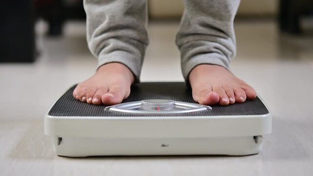This is a man that doing morning routine weight monitor