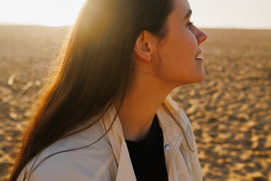 Portrait of a Woman on a Sandy Beach