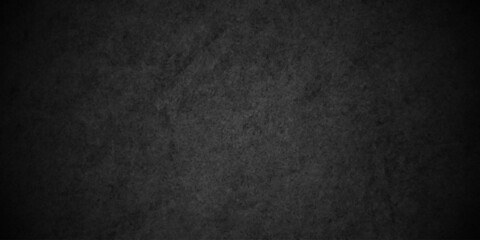 Fototapeta premium Distressed dark black old wall paper grunge background. black paper blackboard chalkboard texture. black concrete wall texture vintage grunge charcoal rough backdrop background. 