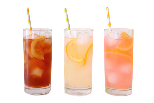 Glasses of summer iced tea, lemonade and pink lemonade with and straws isolated on a white background