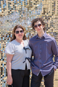 Portrait of mother and son on college graduation day, Oshawa, Canada