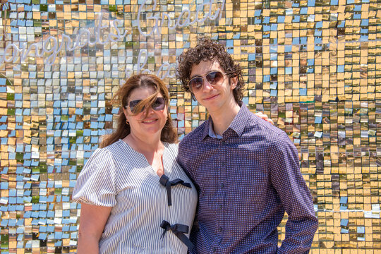 Portrait of mother and son on college graduation day, Oshawa, Canada