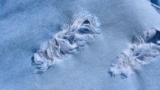 Detailed denim close-up, revealing the indigo blue texture and stitching, perfect for fashion and design projects.