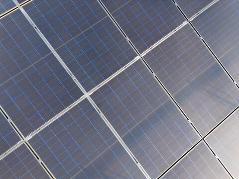Isolated black modern photovoltaic solar panels for rooftop electricity generation