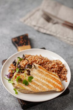 Steak turkey grill, buckwheat  and microgreens in a plate . Diet nutrition
