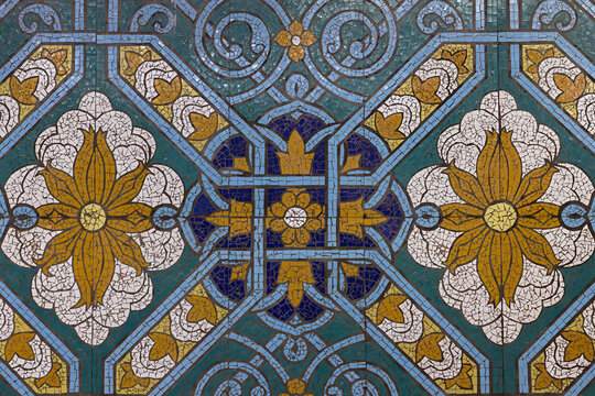 Ornamental mosaic tilework with floral and geometric patterns at Pakhtakor metro station in Tashkent, Uzbekistan. Ideal for design inspiration, cultural publications, and architectural references.