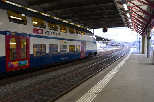 Diminishing perspective of platform at railway station of Swiss city of Winterthur on a summer sunset. Photo taken June 27th, 2026, Zurich Winterthur, Switzerland.
